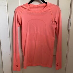 Lululemon Athletica Swiftly Tech 2.0 hip length in coral